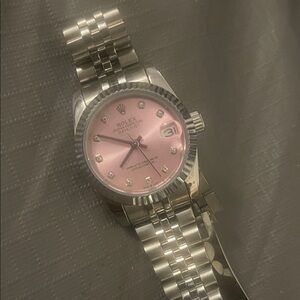 Rolex Women's Silver and Pink Watch